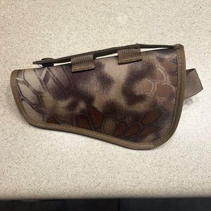 Marsupial gear bottom draw pistol holster